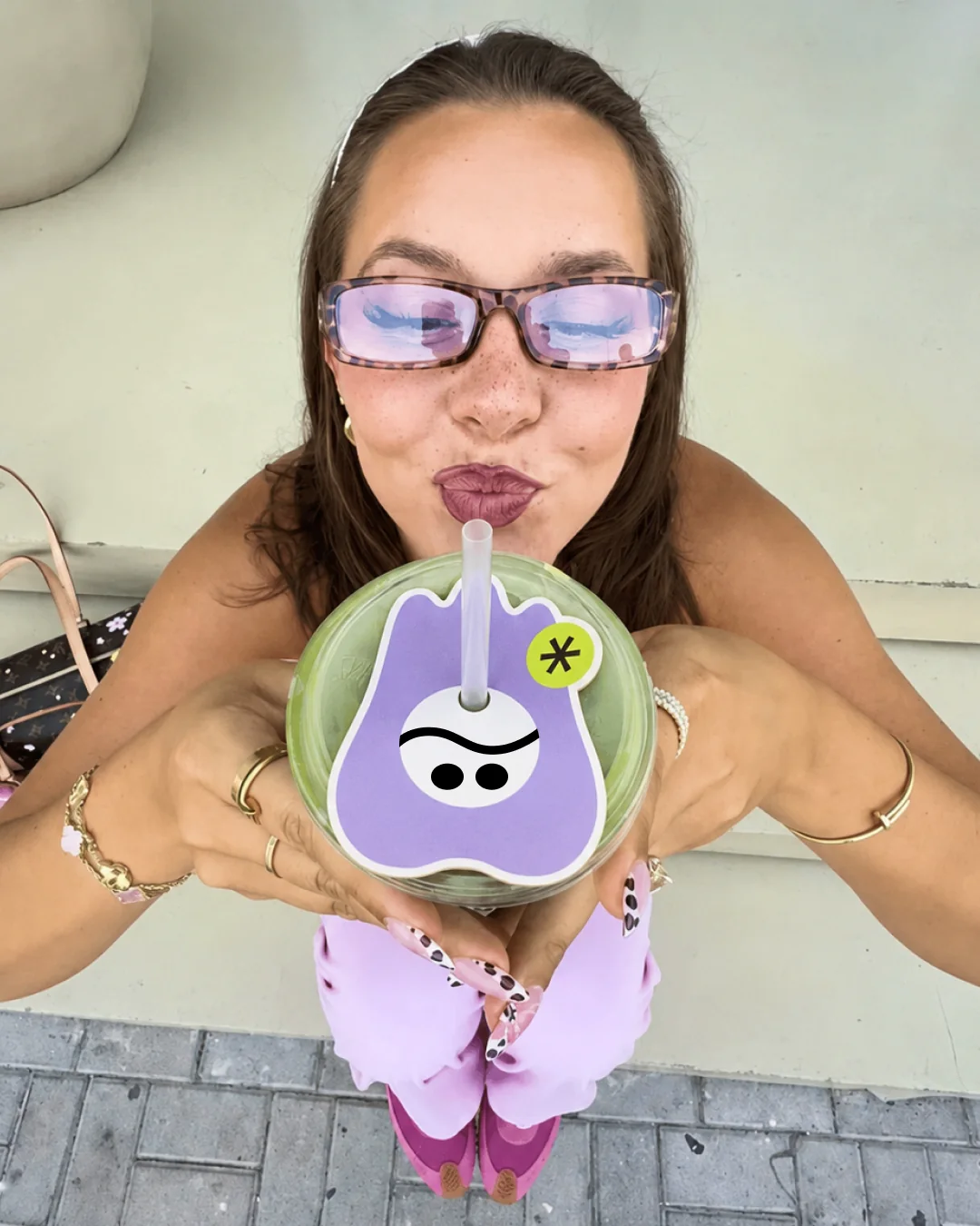 Guest enjoying a KopaTea drink